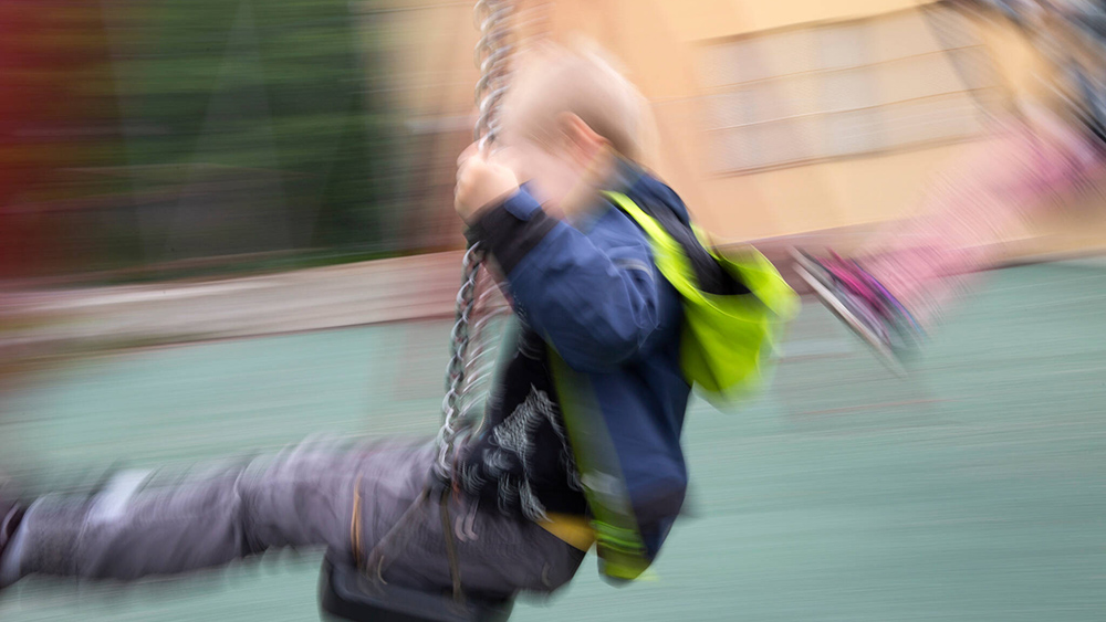 Children swinging